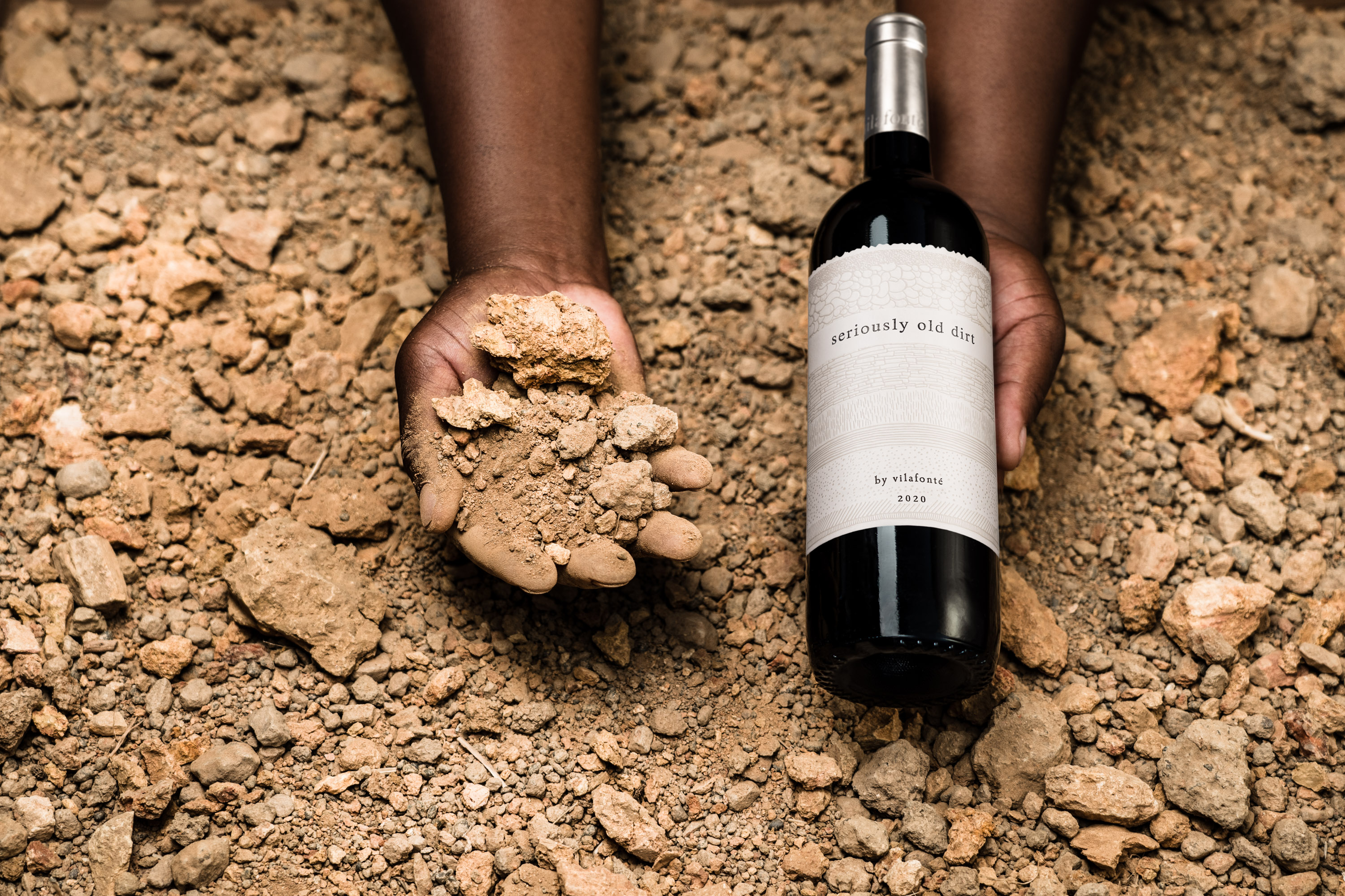 Winegrower Hands In Soil Colour
